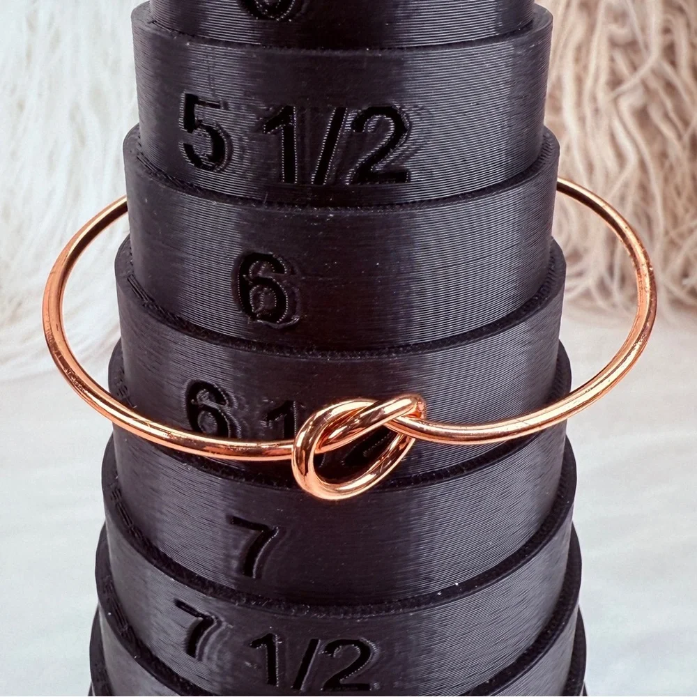 Pretty rose goldtone knotted minimalist cuff bracelet